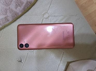 galaxy a100: Samsung Galaxy A04e, rəng - Çəhrayı — 1