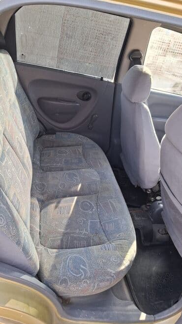 faizsiz kreditlə maşın: Daewoo Matiz, qızılı rəng, 5 qapılı şəhər avtomobili. Xüsusiyyətlər — 2