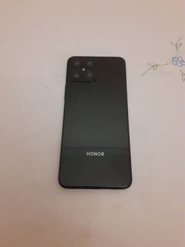 telefon cib: Honor Markali telefon 4 kamerasi var. - Tam ekran ön panel, yuxarı — 2