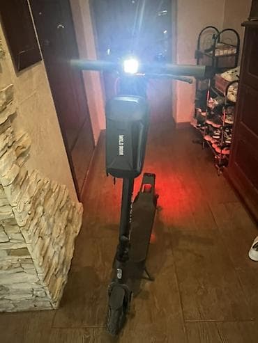 electro gitara: Xiaomi elektrik skuter. Şəkillərdə qara rəngli, minimalist dizayna — 10