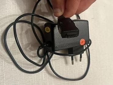 ev modemi: Telefon və elektronika aksesuarları dəsti Tərkib: - Divar adaptoru — 3
