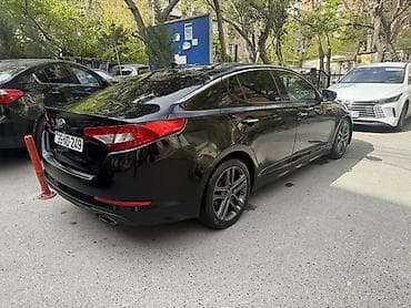 Avtomobil satışı: Kia Optima – qara rəngli, zərif və dinamik sedan. - Korpus: 4 qapılı — 2