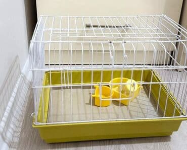 dovşan kamera: Клетка с посудой для кормления — 1