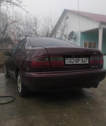 avto rullar: Toyota Carina E: 2 l | 1994 il Sedan — 4