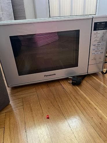 soyuducu metbex: Mikrodalğalı soba Panasonic, Ayrıca dayanan, Mikrodalğalar ilə, rəng - Gümüşü — 3