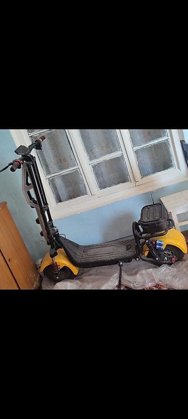 Elektrik nəqliyyatı: Elektrik skuter – güclü və komfortlu şəhər nəqliyyatı - Rəng — 1