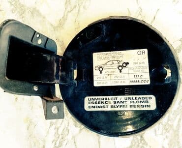 prius disk təkər: Qara rəngdə olan bu yanacaq çəninin qapağı, benzin doldurma yerini — 1