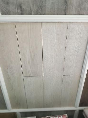 Açıq ağac naxışlı döşəmə laminatı - Rəng/tona: açıq bej–ağ palıd at lalafo.az Açıq ağac naxışlı döşəmə laminatı - Rəng/tona: açıq bej–ağ palıd