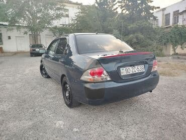 turbo az 06 lar: Mitsubishi Lancer: 1.3 l | 2006 il 300000 km — 10