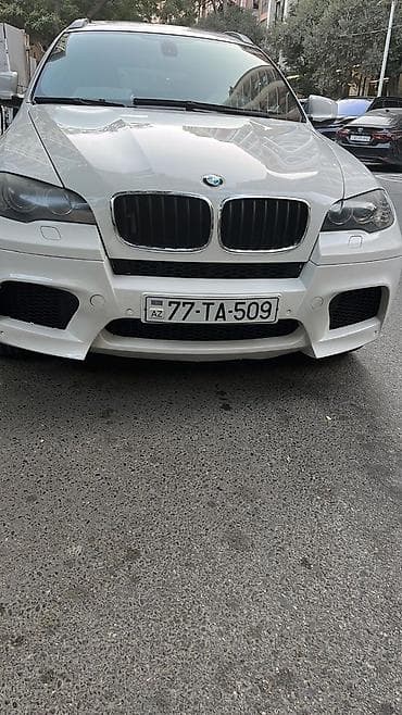 ağ 07 sekilleri: BMW X6, ağ rəng, 4 qapılı kupe-SUV gövdə. Güclü və dinamik görünüşlü — 1