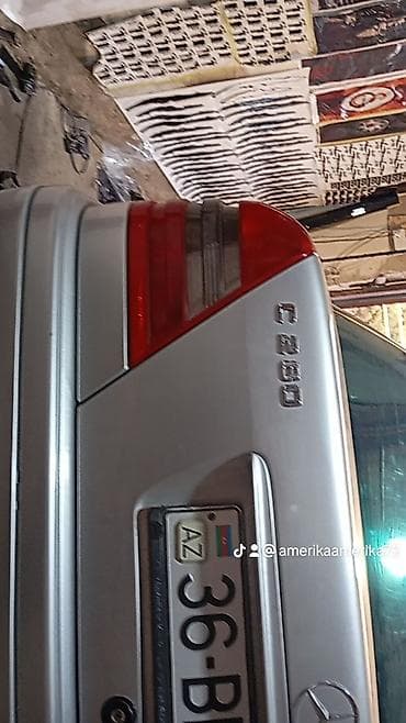 şuşə silən: Mercedes-Benz C-Class: 2.8 l | 1994 il Sedan — 6