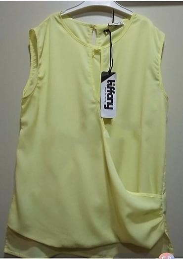 Model: Qolsuz, yüngül bluz Rəng: Açıq sarı (lemonsarı) Material — 2