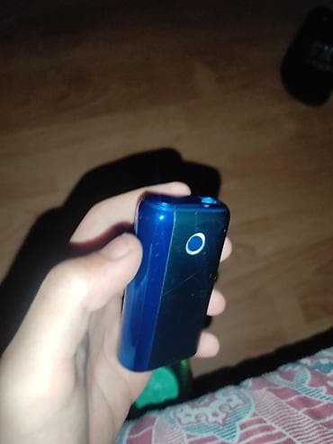 Məhsul: Kompakt elektron siqaret (vape) qurğusu – göy/yaşıl rəng
