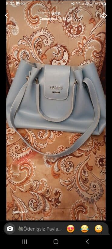 Çanta dəsti, Guess
