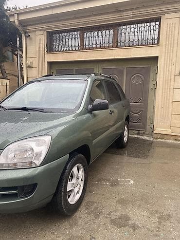 Kia: Kia Sportage: 2 л | 2007 г. Кроссовер — 2