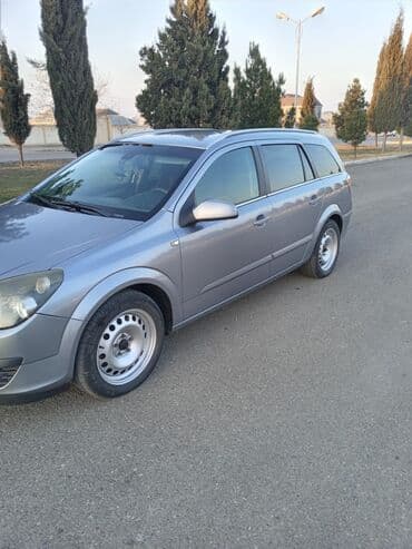 ucuz tofaş: Opel Astra H Caravan (universal), boz rəng. - Kuzov: 5 qapılı — 2