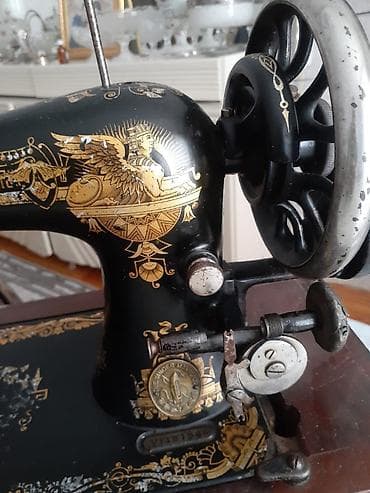 sfinks satilir: Antik tikiş maşını – The Singer Manufacturing Co. - Mexaniki, əl — 1