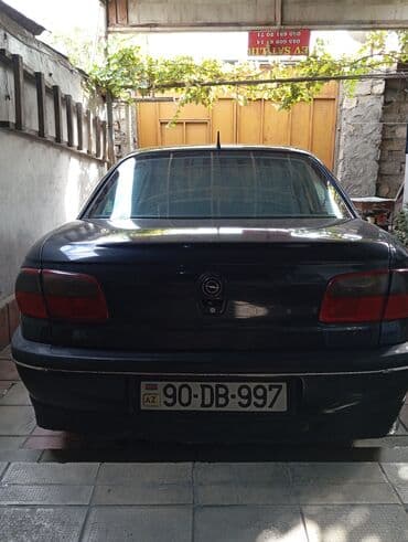 diffuser satisi: Opel sedan - Kuzov: 4 qapılı sedan, tünd rəng - Nömrə: AZ 90-DB-997 — 1