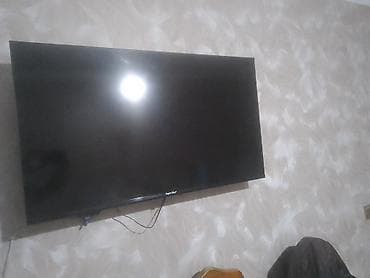 Super Max divar tipli televizor - Böyük ölçülü, nazik çərçivəli ekran