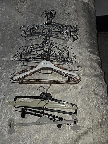 Müxtəlif növ paltar asqıları dəsti 34 eded mohkem vesilka 10 m -