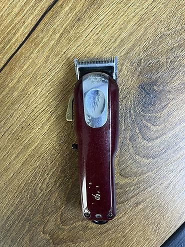 Peşəkar saç kəsim maşını İşlək vəziyyətdədədir Adapdır və başlıqlar