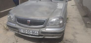 масляный радиатор: Gümüşü rəngdə, sedan tipli avtomobil. Qabaq hissəsində radiator — 1