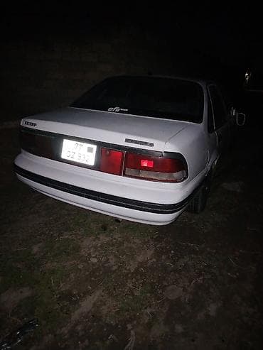 r13 disklər: Daewoo Nexia, ağ rəng, sedan gövdə. Xüsusiyyətlər: maşın sokulur — 2