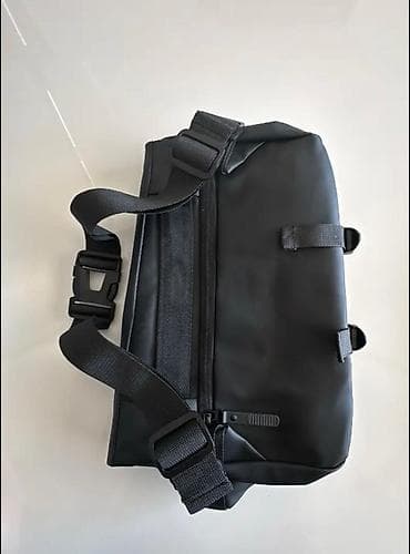 velosiped idman: Minimalist dizayna malik qara çiyin çantası. Xüsusiyyətlər: - Suya — 2