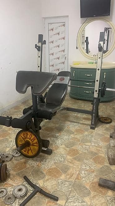 Orginal oliypic universal trenajoru Əlavə olaraq 1 cüt 30 kq açılıb