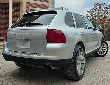porsche disk: Porsche Cayenne (1-ci nəsil) – gümüşü rəngli SUV ili 2003 mator 4.5 — 6