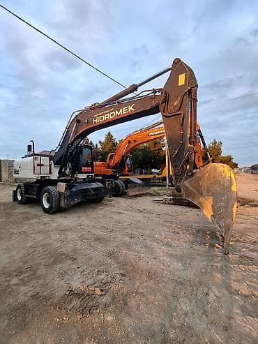 avtomobil icarəyə: Salam Tekerli ekskavator icaresi Ayliq ve günlük — 4