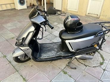 elektron bike: 100-80 km gedır max suret 75 dı 2-3 saat tam dolur kuryer ucun — 2