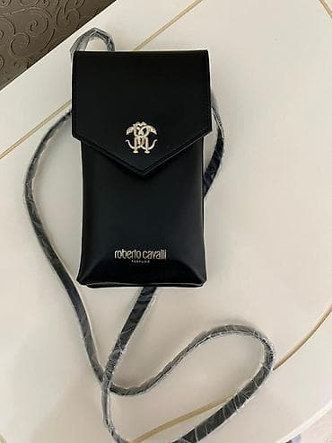 Сумки: Roberto Cavalli Parfums dizaynlı qadın çantası. Qara rəngdə, zərif və — 1