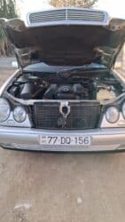 mercedes c dizel: Mercedes-Benz E 240: 2.4 l | 1998 il Sedan — 12