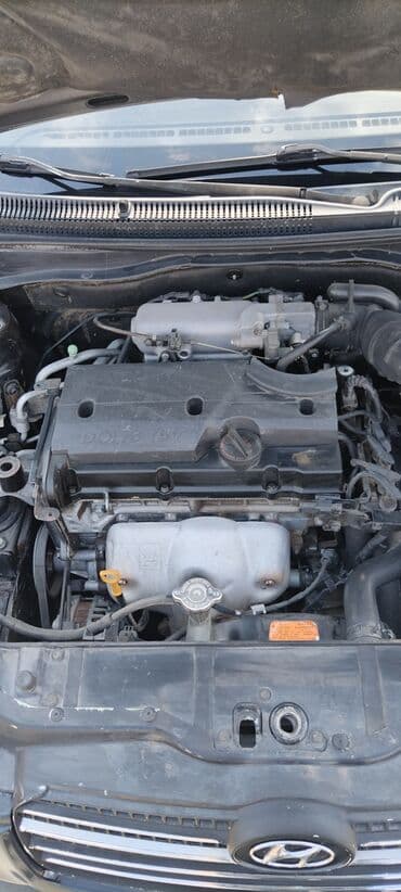 hundai disk: Hyundai Accent: 1.4 l | Sedan — 12