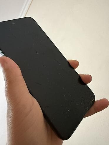 redmi note 12 s: Redmi smartfon Xüsusiyyətlər: - Arxa tərəfdə “Redmi” loqolu mat qara — 5