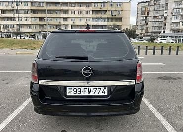 opel astra 2017: Opel Astra H Caravan (universal) – qara rəngdə, 5 qapılı şəhər və ailə — 5