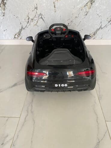 oyuncaq it: Uşaq elektrik avtomobili – qara rəng, sport dizayn - Model nömrəsi — 4