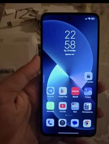 Мобильные телефоны и аксессуары: Xiaomi 12, 256 ГБ, цвет - Черный, 
 Две SIM карты — 1