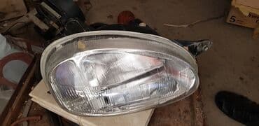 Ötürücü qutuların detalları: Sağ, Yaxın və uzaq vuran işıqlar Opel — 2