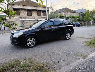 bmw e60 disk: Opel Astra: 1.4 l | 2007 il 286900 km Universal — 6