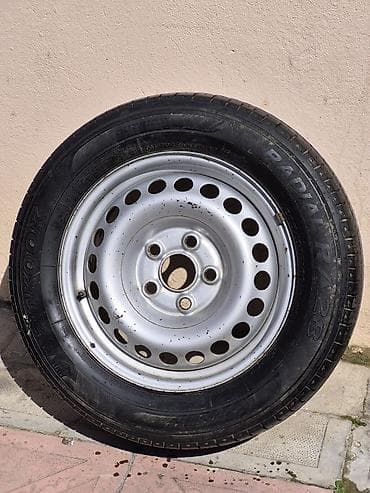 Su nəqliyyatı: Yol şinləri – yay üçün - Nümunə: asimmetrik yönsüz protektor dizaynı — 2