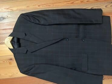 kişi ucun klassik qara kostyum: 200 manata alınıb, çox geyinilmiş kostyumdur. Dəstə püncək və şalvar — 1