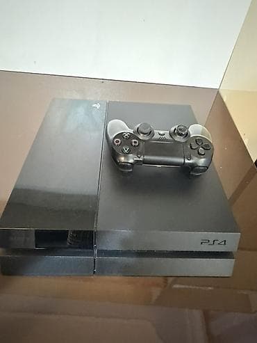 PlayStation 4 (PS4) oyun konsolu + 1 ədəd pult + 4 oyun