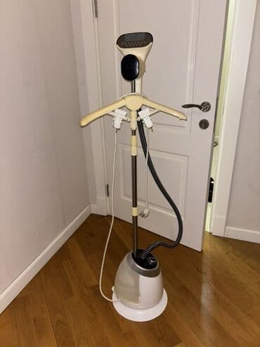 utuler: Şaquli buxarlı ütü paltarların qırışlarını açmaq üçün rahat və — 2