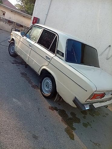 Nəqliyyat: VAZ 2106 sedan - Korpus: 4 qapılı, bej/ağ rəng, xrom bamperlər — 1