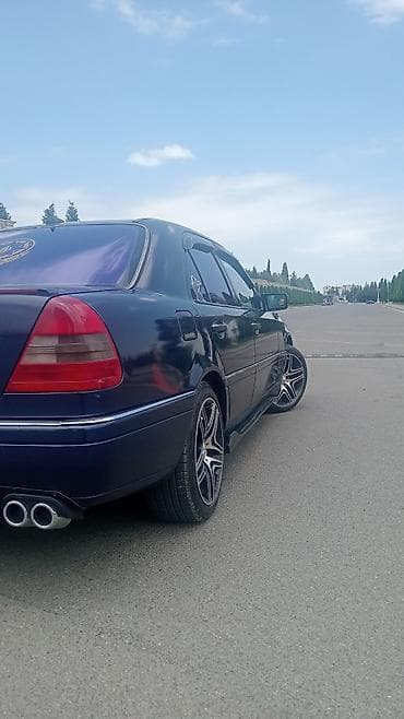 Mercedes-Benz C-sinfi sedan - Kuzov: 4 qapılı sedan, tünd mavi rəng - — 7