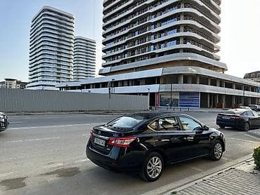Nissan Sentra: 1.6 л | 2014 г. Седан — 5