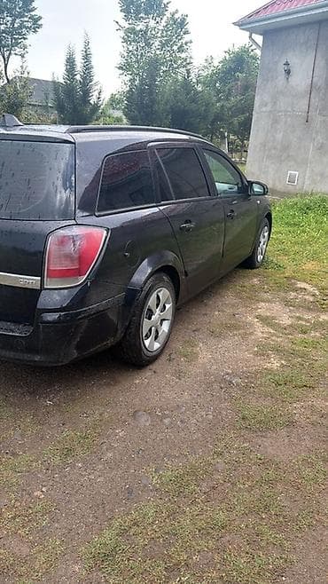 kia optima 2 sade mator: Opel Astra: 1.3 l | 2006 il Universal — 4