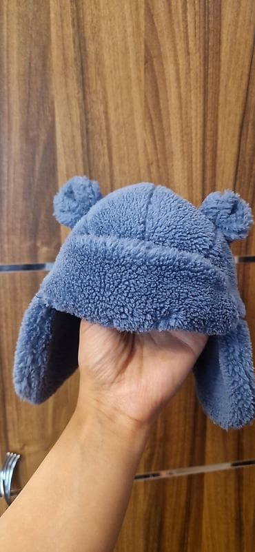 Üst geyimləri: Məhsul: Next marka körpə papağı - Ölçü: 6–12 ay (etiketdə qeyd: 11 — 1